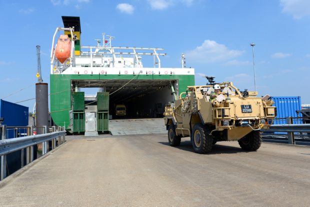 A Jackal armoured vehicle returns from Afghanistan disembarking from a merchant vessel at Marchwood, Hampshire. Military Vehicles and equipment from Afghanistan arrived on merchant ship EDDYSTONE at the Sea Mounting Centre in Marchwood (Military Port), ready for the Roll On Roll Off load operation. Elements from 17 Port and Maritime Squadron helped in the unloading process. As of 31 May 2013, the UK has redeployed 625 vehicles (18.7%), major equipment and 1080 (19.7%) twenty foot equivalent units of materiel from Afghanistan. The Uk does not underestimate the scale of the effort that is required. Considerable work and personnel are in place to support it. Image: A JACKAL armoured vehicle being un loaded from the EDDYSTONE Photographer: Cpl Lu Scott